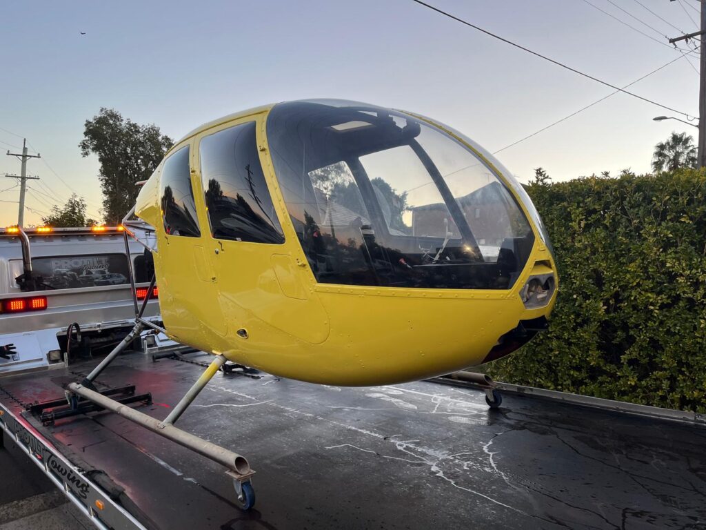 Helicopter cabin finished in yellow after respray