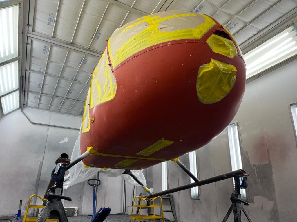 Freshly painted helicopter panel masked for the next colour