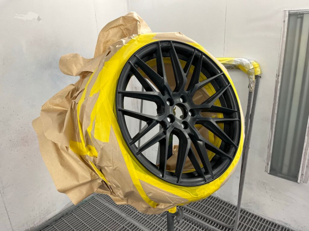 Alloy wheel refinished in satin black