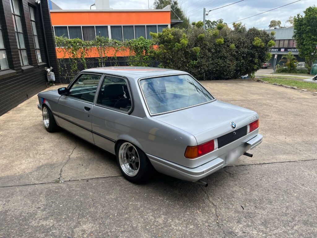 Classic BMW E21 coupe after respray, rear three-quarter view