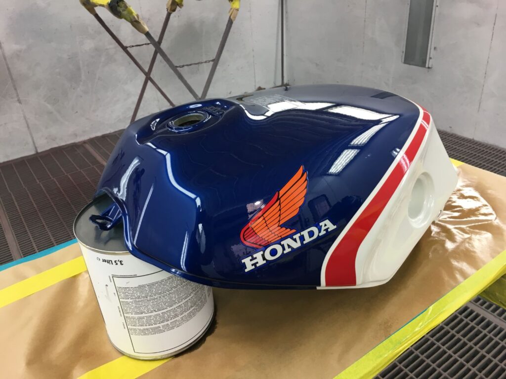 Honda VFR motorcycle fuel tank after respray and clear coat