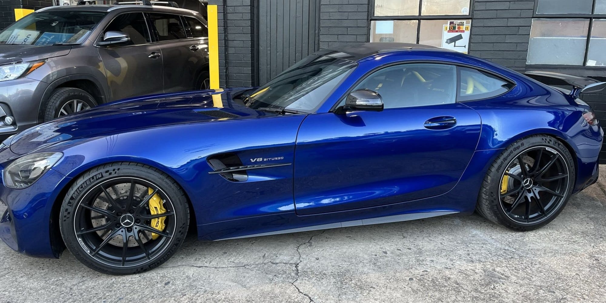 Blue Mercedes-AMG GT at the Bailey Smash Repairs workshop in North Parramatta