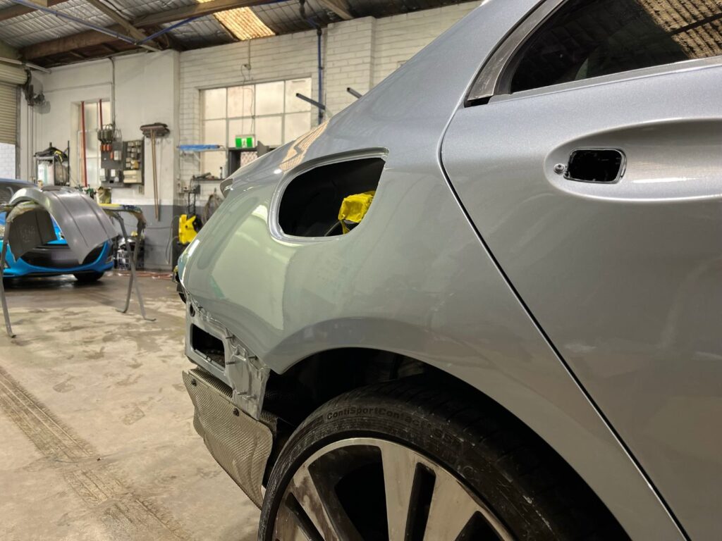 Mercedes-Benz C-Class rear quarter refinished in the spray booth