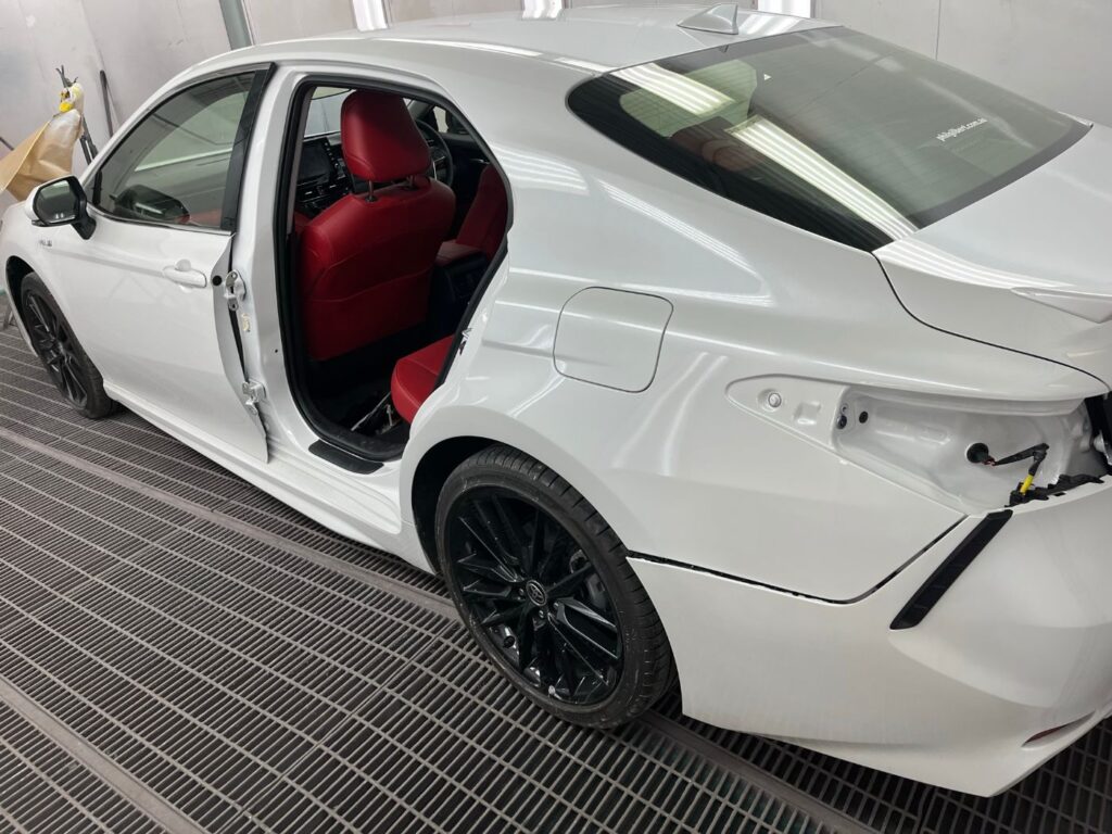 Toyota Camry rear quarter refinished in the spray booth