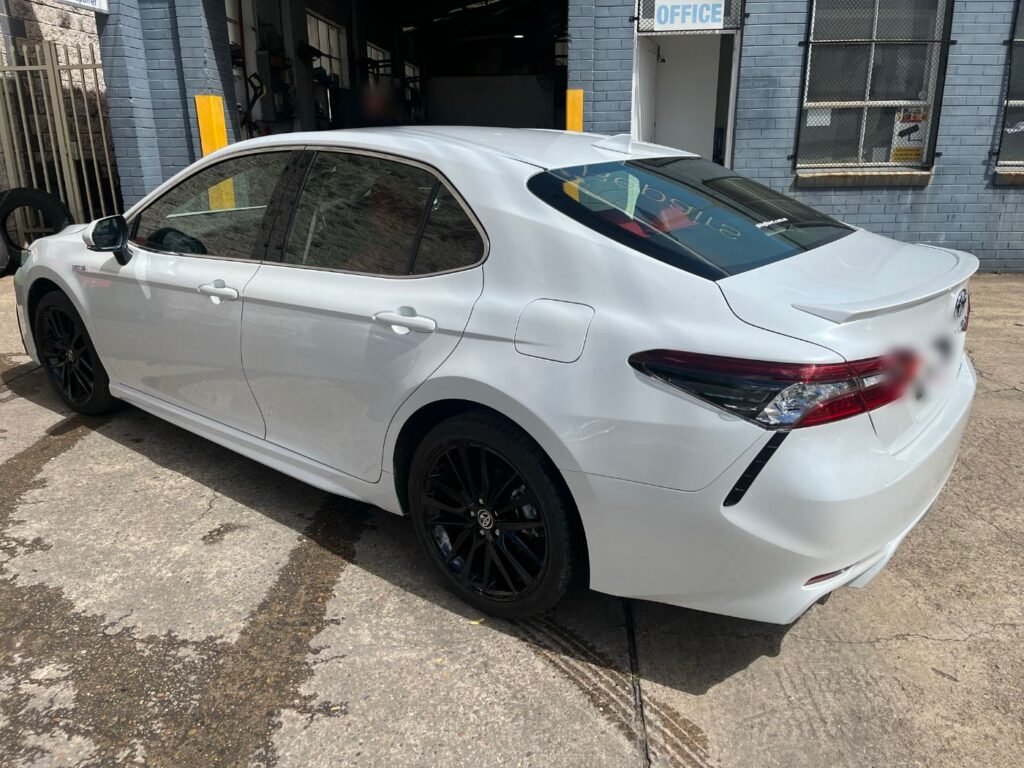 Toyota Camry after repair outside the Bailey Smash Repairs workshop