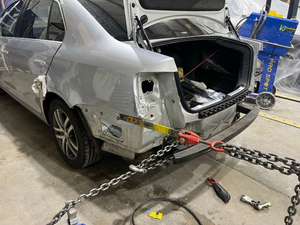 Volkswagen Jetta on the chassis pulling rig for straightening