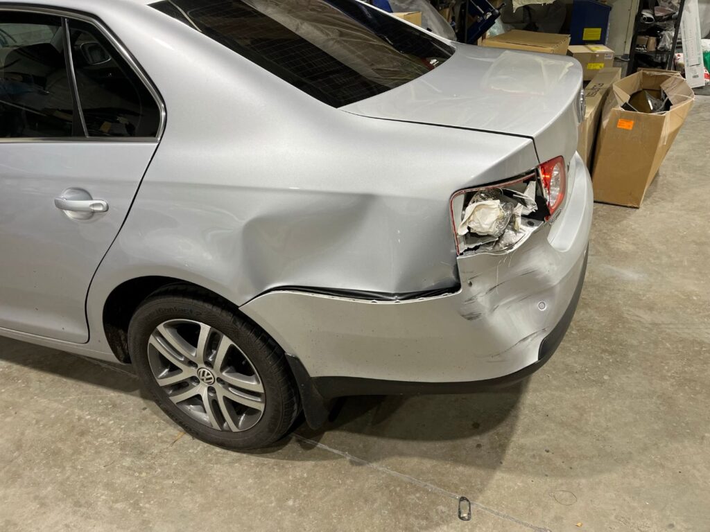 Volkswagen Jetta with rear-end collision damage before repair