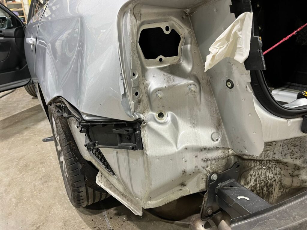 Volkswagen Jetta rear panel damage with bumper removed